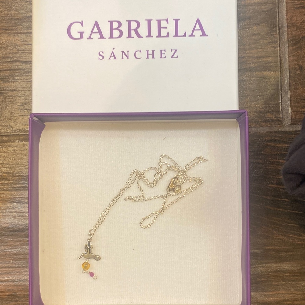 Gabriela Sanchez silver necklace and hummingbird pendant